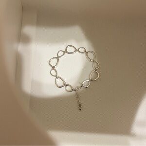 SAQ Avon Silver Tone Freeform Circle Links Bracelet